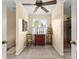 Bright hallway with natural light and a decorative accent table at 1083 Wash Lee Sw Dr, Lilburn, GA 30047