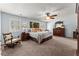 Spacious main bedroom with plush carpeting and plenty of natural light at 1083 Wash Lee Sw Dr, Lilburn, GA 30047