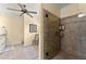 Contemporary bathroom with a sleek, glass-enclosed tiled shower at 1083 Wash Lee Sw Dr, Lilburn, GA 30047