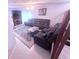 Inviting living room with a fireplace, large TV, and comfortable seating arrangement at 2331 Georgia Lane, Snellville, GA 30078