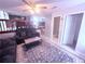 Living room with stylish furnishings, a comfortable sofa, and an open layout at 2331 Georgia Lane, Snellville, GA 30078