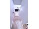 Staircase leading down to the lower level of the home, showcasing open concept living at 2331 Georgia Lane, Snellville, GA 30078