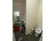 Bathroom with a toilet, mirror and sink at 5390 Regency Lake Court, Sugar Hill, GA 30518