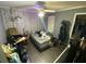 Bedroom with a bed, window, fan and closet at 5390 Regency Lake Court, Sugar Hill, GA 30518