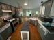 Spacious kitchen featuring stainless steel appliances and gray cabinets at 5390 Regency Lake Court, Sugar Hill, GA 30518