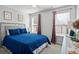 Comfortable bedroom featuring natural light and a cozy bed at 543 Walnut Way, Palmetto, GA 30268