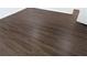 Dark brown laminate flooring adds a modern and sophisticated touch to the home's interior at 1321 Bridges Sw Ave, Atlanta, GA 30310