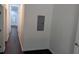 Hallway with wood-look flooring and a metal electrical panel box on the wall at 1321 Bridges Sw Ave, Atlanta, GA 30310