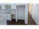 The kitchen is adorned with granite countertops and brand-new appliances at 1321 Bridges Sw Ave, Atlanta, GA 30310