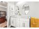 Bathroom featuring double vanity with modern square sinks and neutral tones at 1450 Elizabeth Ln, Atlanta, GA 30344