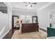 Bedroom featuring hardwood floors, large mirrors, and neutral tones for a calm and relaxing atmosphere at 1450 Elizabeth Ln, Atlanta, GA 30344