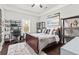 Bedroom features a work station area, neutral tones and natural light at 1450 Elizabeth Ln, Atlanta, GA 30344