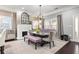 Dining room featuring a fireplace and unique decor, including a purple dining set at 1450 Elizabeth Ln, Atlanta, GA 30344