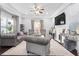 Bright living room featuring stylish furnishings, large windows, and a cozy atmosphere at 1450 Elizabeth Ln, Atlanta, GA 30344