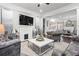 Comfortable living room with stylish decor, a fireplace, and abundant natural light at 1450 Elizabeth Ln, Atlanta, GA 30344