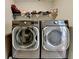 Laundry room with front load washer and dryer at 1627 Amhearst Walk Rd, Lawrenceville, GA 30043