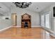 Bright living room featuring vaulted ceilings, a hutch, and gleaming hardwood floors at 1627 Amhearst Walk Rd, Lawrenceville, GA 30043