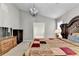 Comfortable bedroom featuring carpet flooring, large bed, and bright windows at 1627 Amhearst Walk Rd, Lawrenceville, GA 30043