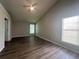 Inviting bedroom featuring vaulted ceilings, a ceiling fan, and windows that provide ample natural light at 3718 Jackson Bluff Dr, Lawrenceville, GA 30044