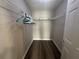 Walk-in closet with built-in shelving, maximizing storage space and organization at 3718 Jackson Bluff Dr, Lawrenceville, GA 30044