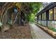 Private backyard featuring stone path and trees with a relaxing hammock at 6305 River Chase Cir, Atlanta, GA 30328