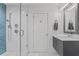 Bright bathroom with a glass-enclosed shower, modern vanity, and sleek fixtures at 6305 River Chase Cir, Atlanta, GA 30328