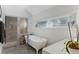 Bright bathroom featuring a freestanding tub, glass shower, wood floors, and abundant natural light at 6305 River Chase Cir, Atlanta, GA 30328