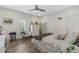 Bright bedroom with wood floors and eclectic decor, featuring a cozy seating area at 6305 River Chase Cir, Atlanta, GA 30328