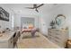 Bright bedroom with modern ceiling fan, stylish decor, and a cozy shag rug at 6305 River Chase Cir, Atlanta, GA 30328