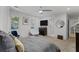 Bright bedroom features plantation shutters, a ceiling fan, and modern design at 6305 River Chase Cir, Atlanta, GA 30328