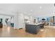 Open concept kitchen features a large island, stainless steel appliances, and adjacent dining area at 6305 River Chase Cir, Atlanta, GA 30328