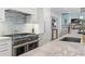 Modern kitchen with marble countertops, stainless steel appliances, and stylish cabinetry at 6305 River Chase Cir, Atlanta, GA 30328