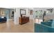 Inviting living room featuring hardwood floors, elegant furniture, and a fireplace for a cozy atmosphere at 6305 River Chase Cir, Atlanta, GA 30328