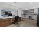 Office featuring built-in desk, counter space, kitchenette, and sleek design at 6305 River Chase Cir, Atlanta, GA 30328