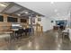 Open office space with multiple desks, seating, polished concrete floors and ample work areas at 6305 River Chase Cir, Atlanta, GA 30328
