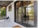 Relaxing covered porch with a table, chairs, and open view to the outdoors at 6305 River Chase Cir, Atlanta, GA 30328