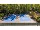 Aerial view of two fenced, outdoor tennis courts on a sunny day at 6305 River Chase Cir, Atlanta, GA 30328