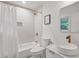 Fresh bathroom with white vanity, shower-tub, and stylish fixtures at 2244 Alpha Dr, Decatur, GA 30032