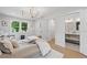 Stylish bedroom with decor wall, wood floors, and an en suite bathroom at 2244 Alpha Dr, Decatur, GA 30032
