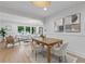 Open-concept dining and living area is filled with natural light at 2244 Alpha Dr, Decatur, GA 30032