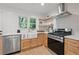 Modern kitchen features a stainless steel range and bright countertops at 2244 Alpha Dr, Decatur, GA 30032