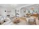 Open concept living area with dining space and abundant natural light at 2244 Alpha Dr, Decatur, GA 30032