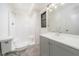 Clean bathroom featuring a tub-shower and modern vanity at 3066 Malvern Dr, Snellville, GA 30039