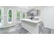 Chic kitchen island with sleek gray cabinetry and quartz countertops at 3066 Malvern Dr, Snellville, GA 30039