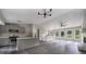 Modern kitchen with stainless steel appliances, quartz countertops, and a large island at 3066 Malvern Dr, Snellville, GA 30039
