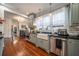 Bright kitchen features custom cabinets, modern appliances, and ample counter space, perfect for cooking at 4527 Dallas St, Acworth, GA 30101