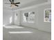 Spacious bedroom boasts abundant natural light and plush carpeting for a warm and inviting atmosphere at 3006 Sea Aster Way, Buford, GA 30519