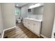Bathroom featuring double sink vanity, modern fixtures, and ample counter space at 336 Shady Lane Cir, Canton, GA 30115