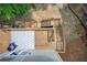 Aerial view of spacious back deck with stairs, stylish outdoor furniture, and wooded surroundings at 3999 Bayside Cir, Doraville, GA 30340