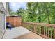 Enjoy the outdoors on this charming back deck with wooded view at 3999 Bayside Cir, Doraville, GA 30340